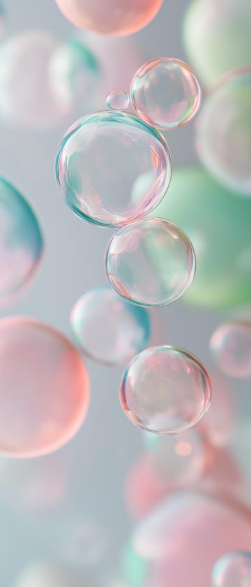 Floating translucent spheres in pastel colors with light passing through them
